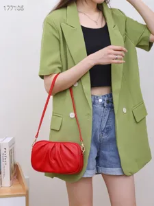 Red leather pleated shoulder bag for women, stylish soft crossbody handbag with zipper.