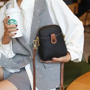 Genuine leather mini crossbody bag casual phone shoulder bag with elegant brown flap design.