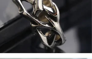 Detail shot of men gothic thorn ring antique silver open punk finger jewelry accessory