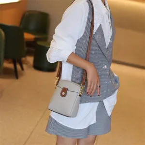 Mini leather crossbody phone bag for women, stylish single shoulder casual handbag detail.