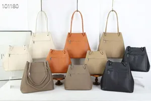 Detailed view of genuine leather bucket bags in multiple colors showcasing large capacity.