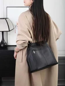 Genuine leather bucket bag for women, large capacity shoulder bag and casual tote bag.