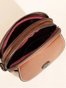 Brown leather crossbody phone bag with multi-layer zipper and stylish vertical design.