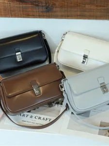 Modische vintage Damen Umhängetasche, elegante PU Leder Handtasche mit Schloss für Alltag.