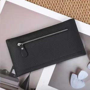 Black genuine leather long wallet for women, slim minimalist design with secure zipper pocket.
