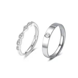 Minimalist couple rings set with sparkling zircon stones, elegant open design for daily wear.