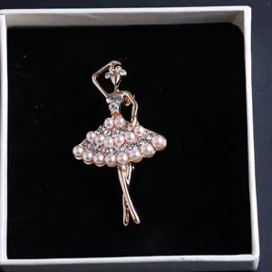 Elegant rhinestone ballet dancer brooch with pearls, exquisite clothing accessory.