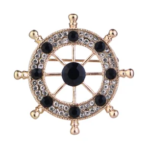 Spilla timone navale marinara con strass luminosi e cristallo blu per risvolto abito.