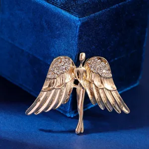 Detailed view of gold angel wings men brooch, elegant rhinestone lapel pin accessory.