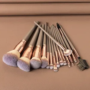 Professional 15-piece makeup brush set with soft gradient bristles and rose gold handles.