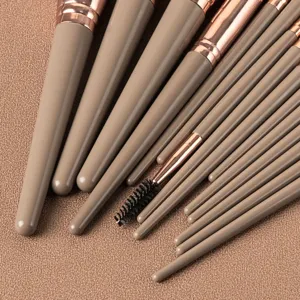 Professional makeup brush set detail view, soft bristles for flawless face and eye makeup.