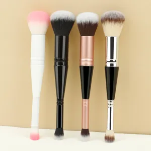 Double ended makeup brush detail showing dual side bristles for foundation and concealer.