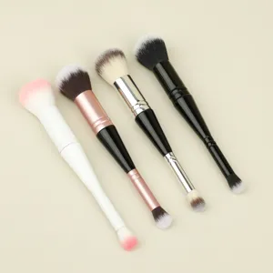Close-up of dual-ended makeup brushes showcasing soft bristles and sleek handles for easy blending.