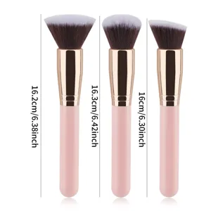 Set de tres brochas de maquillaje profesionales con mangos rosa y cerdas suaves para la cara.