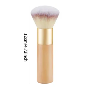 Large soft makeup brush for loose powder and mineral foundation with wooden handle.