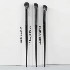 Set of 3 professional black handle makeup brushes for eyeshadow and highlighting.