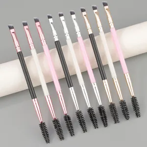 Professional dual-ended eyebrow brush and spoolie set with angled tips for precise eye makeup tools.