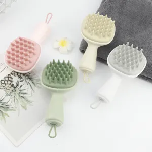 Cepillo de silicona para masaje de cuero cabelludo con mango y cordón para cabello