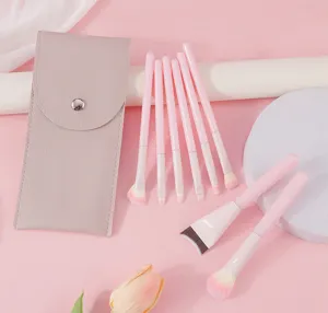 Set di 8 pennelli trucco rosa pesca setole morbide accessori cosmetici vista dettagli.