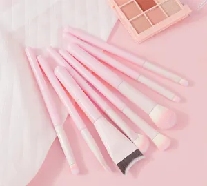 Set di pennelli da trucco rosa pesca professionale, 8 pezzi setole morbide vista dettagliata.