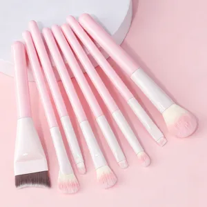 Set di pennelli da trucco rosa di 8 pezzi con setole morbide per un trucco viso impeccabile.