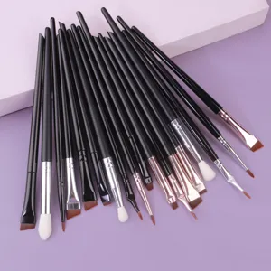 Detailed view of professional makeup brush set featuring various precision eye and liner tips.