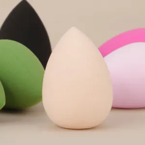 Multicolor teardrop makeup sponge set, soft blending puff for flawless liquid foundation application.