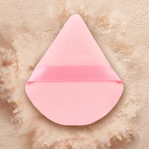 Triangle makeup powder puff for liquid foundation and setting powder, soft velvet cosmetic tool.
