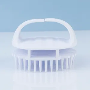 Silicone scalp massage shampoo brush, ergonomic white hair scrubber for daily bath use.