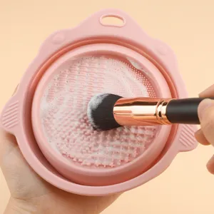 Silicone makeup brush cleaning pad with textured surface for deep cleaning detail.