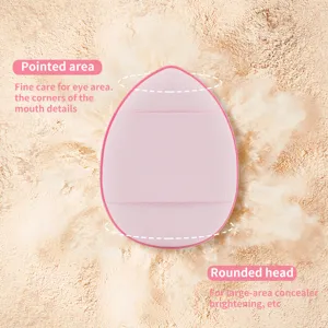 Detailansicht des rosa Make-up-Schwamms mit spitzer und runder Seite für präzise Anwendung.