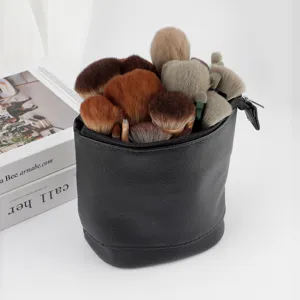 Black PU leather telescopic makeup brush holder, large capacity portable cosmetic pouch.