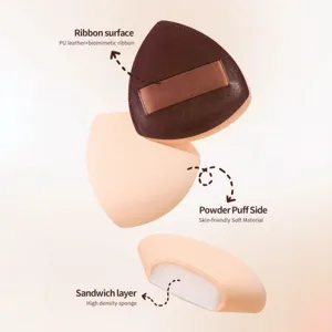 Triangle makeup puff with PU leather ribbon surface and high density sponge sandwich layer.