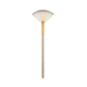 Professional fan makeup brush with soft synthetic bristles and elegant champagne handle for highlight.
