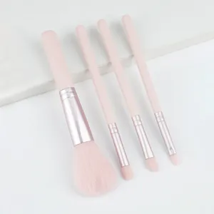 4-piece pink makeup brush set with powder blush and eyeshadow brushes for daily beauty.