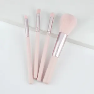 Professional 4-piece pink makeup brush set, soft synthetic bristles for flawless blending.