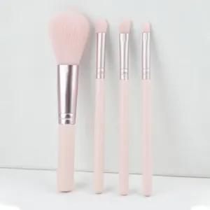 4-piece pink makeup brush set, soft synthetic hair for powder, blush and eyeshadow application.