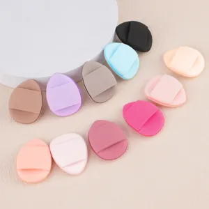 Close-up detail of colorful latex-free makeup finger puffs with soft bands for makeup.