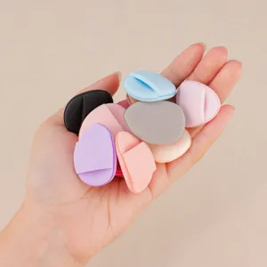 Finger makeup puff set, soft sponge material for precise foundation application. Detail view.