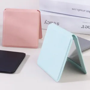Portable square makeup mirror, double-sided folding cosmetic mirror for travel and desktop.