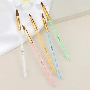 Detail view of crystal handle nail art brushes set with colored spiral designs and fine tips.