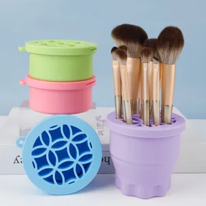 Silicone makeup brush cleaner folding cup detail view, convenient tool storage box.