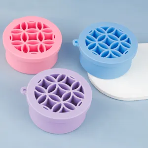 Collapsible silicone cleaning cup for makeup brushes, portable drying and storage organizer.