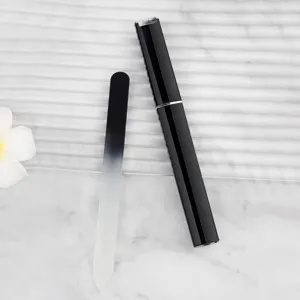 Portable glass nail file with sleek black storage case for professional manicure care.