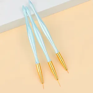 Detail view of 3pcs nail art liner brushes with colorful blue handles and fine tips.