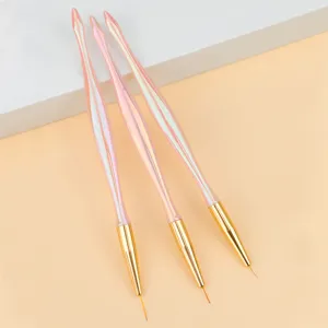 Detailed view of a 3-piece iridescent pink nail art liner brush set with fine golden tips.