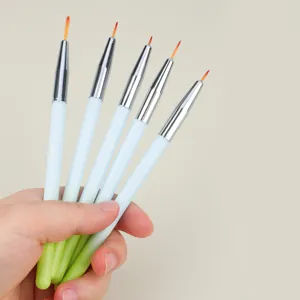Detail view of five gradient nail art liner brushes with metal ferrules for fine painting.