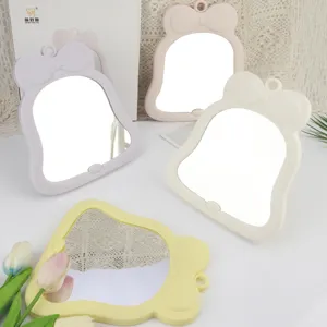 Detailansicht süßer Schleifen Kosmetikspiegel Tischspiegel tragbarer Prinzessin Make-up Spiegel.