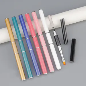 Close-up detail of dual-ended nail art brushes and metal pushers in various vibrant colors.