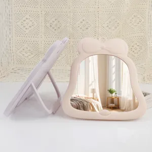 Tisch-Schminkspiegel mit süßem Schleifen-Design, perfekt für den täglichen Gebrauch zu Hause.